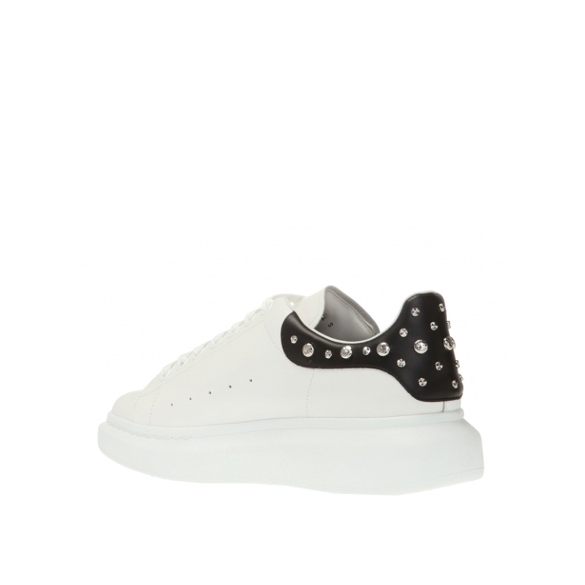 ALEXANDER MCQUEEN  Sneakers in Pelle Borchiata Bianche Alexander McQueen Uomo In Linea